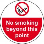 In the photo, you can see a vibrant Spectrum Industrial Floor Graphic with the words No Smoking Beyond This Point printed on it. The graphic has a diameter of 400mm and is laminated for anti-slip protection. The glossy finish of the sign adds a professional touch to any industrial setting.