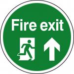 The image shows a round floor graphic featuring a man running up a staircase surrounded by a bold arrow pointing upwards. The graphic is anti-slip and laminated, ensuring safety in industrial fire and safety situations.