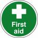 This photo features a round, anti-slip laminated floor sign with the words First Aid in bold letters. The sign is designed by Spectrum Industrial and is part of their collection of first aid signs. The colors are bright and eye-catching, making it easy to spot in an emergency. The size of the sign is 400mm in diameter and it is specifically designed for use on floors.