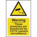 This picture shows a Spectrum Industrial CCTV sign, measuring 200 x 300mm and made of 1.2mm recyclable PP, stating Warning: These premises are monitored by CCTV camera surveillance. The sign serves as a clear and visible indication of surveillance on the premises.