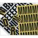 This image features a set of white magnetic letters, each measuring 39mm, designed for use on Spectrum Industrial Warehouse signage. The letters are bright, bold, and easy to read, making them ideal for labeling and organizing items in a warehouse setting. The set includes multiple letters to create various words and messages.