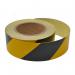 The Spectrum Industrial Safety Barriers Reflective Tape in black and yellow is a highly visible and durable tape, measuring 50mm x 25m. The vibrant, contrasting colors make it easily noticeable and the reflective quality adds an extra layer of visibility, making it ideal for industrial safety purposes.