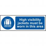 The picture shows a vibrant spectrum of colors on a rectangular PPE sign. The sign reads High visibility jackets must be worn in this area in bold black letters. Made from 1.2mm recyclable PP material, the sign measures 600 x 200mm. Perfect for ensuring safety in industrial settings.