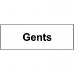 The photo shows two Spectrum Industrial Washroom Signs for gents, made of 1.2mm recyclable PP material in a size of 300 x 100mm. The signs have the word Gents in bold black lettering on a white background, with a pictogram of a male figure on the left. The edges are clean and smooth, and there is a small mounting hole on each side for easy installation. The signs are designed to be durable and long-lasting, making them suitable for a variety of industrial washrooms.