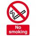 The photograph captures a Spectrum Industrial No Smoking Sign made of Self Adhesive Vinyl, measuring 148mm by 210mm. The bold and clear design features the No Smoking symbol in red and black, making it easily noticeable and effective in enforcing a smoke-free environment.