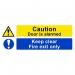 This image features a spectrum industrial fire safety sign for caution, with a clear red fire exit symbol and the words door is alarmed, keep clear in white lettering. The sign is made of self-adhesive vinyl and measures 400mm x 150mm.