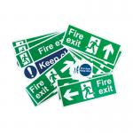 The picture shows a pack of Spectrum Industrial Fire Safety Signs, featuring a Fire Exit Signage. The signs are made of Non-Adhesive 1mm Rigid PVC Board and are small in size, measuring 15070. The signs display clear and bold graphics, with the familiar green and white colors. The pack includes various signs, all designed to ensure proper fire safety measures in industrial settings.