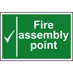 The photo shows a Spectrum Industrial Fire Safety Sign for a fire assembly point. The sign is made of 1.2mm recyclable PP material and measures 300 x 200mm. The bright red and white colors stand out, and the text is clear and easy to read. The arrow pointing towards the assembly point and the fire symbol indicate the purpose of the sign. Overall, the sign appears durable and effective for its intended use.