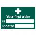 Self adhesive semi-rigid PVC Your First Aider Is/Located sign (300 x 200mm). Easy to fix; simply peel off the backing and apply to a clean dry surface 1551