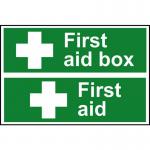 The photograph shows a set of industrial first aid signs featuring a first aid box on a 1.2mm recyclable PP material, measuring 300 x 200mm. The signs are labeled with clear and bold lettering, ideal for any workplace or public setting.