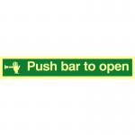 The Spectrum Industrial Fire Safety Signs Push Bar To Open Sign is rectangular and measures 450mm x 100mm. It features a white background with bold, black lettering and a red PUSH bar icon in the center. The sign is made of 1.3mm rigid self-adhesive photoluminescent material, ensuring visibility even in low light conditions.
