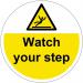 Watch Your Step Floor Graphic adheres to most smooth clean flat surfaces and provides a durable long lasting safety message. 400mm dia. 16000