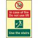 This photo displays a Spectrum Industrial fire safety sign that reads In Case of Fire, Do Not Use Lift, Use The Stairs. The sign is made of flexible photoluminescent vinyl and measures 200mm x 300mm. Bold lettering and clear graphics make it easy to read and understand.
