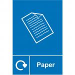 The photograph captures vibrant blue and green industrial waste disposal signs for paper recycling. The signs are made of 1.2mm recyclable PP and measure 150 x 200mm. Bold lettering and arrows indicate the proper disposal method, making it easy to identify and sort paper waste.