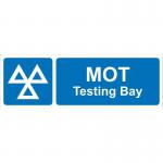 This photograph captures a bustling industrial road lined with bold, distinguishable traffic signs. In the background, a MOT testing bay can be seen, made from 1.2mm recyclable PP material. The photograph is 600 x 200mm in size and offers a clear, informative view of the busy business scene.
