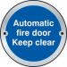 The photo depicts a set of Spectrum industrial room signs for automatic fire doors. Made of satin stainless steel, each sign features a clear keep clear door disc with a diameter of 75mm. These signs are a practical and professional addition to any industrial setting.