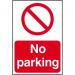 The image shows a wide industrial road with various traffic signs lining the sides. One of the signs clearly displays a red circle with a diagonal line, indicating no parking allowed. The sign is made of 1.2mm polypropylene material and is non-adhesive and non-bagged. Its size is 400 x 600mm, making it easily visible from a distance.
