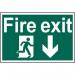 The photograph features a vibrant Spectrum Industrial fire safety sign with the iconic running man symbol and an arrow pointing downwards for a clear fire exit route. Made from recyclable 1.2mm PP material, the sign measures 600 x 400mm in size.
