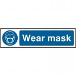 The image shows a red and white sign from Spectrum Industrial with the words Wear Mask prominently displayed. The sign is made of 1.2mm thick recyclable PP material and measures 200 x 50mm. The sign is designed for use in industrial settings to remind workers to wear masks for safety.