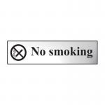 The photo features a Spectrum Industrial No Smoking Sign made of chrome-effect self-adhesive PVC material. The rectangular sign measures 200mm x 50mm and clearly states No Smoking in bold, black lettering against a white background. The sleek design and easy application make it a practical addition to any workplace.