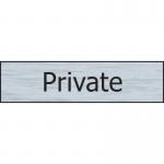 This image features Spectrum Industrial Room Signs Private Sign, crafted from stainless steel effect material. The self-adhesive PVC material measures 200mm x 50mm and has a neat, industrial design. The sign is perfect for labeling private areas in any type of space.