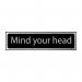 The Spectrum Industrial Room Signs Mind Your Head Sign is sleek and modern, with a black and polished chrome effect. Made of self-adhesive PVC, it measures 200mm x 50mm. The sign clearly warns against low ceilings, keeping safety top-of-mind in industrial settings.