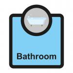 The image shows a light-colored rectangular sign with the words Assisted Living Sign: Bathroom in bold black lettering. The sign has a blue and white Spectrum Industrial Room Signs logo in the upper right corner. The dimensions of the sign are 266 x 310mm.