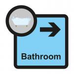 The image shows a Spectrum Industrial directional sign for assisted living, with a bathroom arrow pointing right. The sign is 305 x 310mm in size and labeled as the ALS002 model.