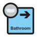 The image shows a Spectrum Industrial directional sign for assisted living, with a bathroom arrow pointing right. The sign is 305 x 310mm in size and labeled as the ALS002 model.