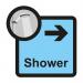 The photo shows a Spectrum Industrial Directional Sign for assisted living, with an arrow pointing right towards a shower. The size is 305 x 310mm and the code is ALS011.