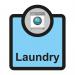 The picture shows a bright and colorful Spectrum Industrial Room Sign for Assisted Living facilities. The sign includes the word Laundry and the letters SA FMX and measures 266 x 310mm. The design is simple and easy to read, with a bold font and graphics. Perfect for assisting residents in finding the laundry area.
