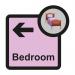 The image shows a Spectrum Industrial Directional Sign for Assisted Living. It features a bedroom arrow pointing left and is sized at 305 x 310mm. The sign is labeled as ALS042 and has the text SA FMX written on it.