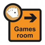 The picture shows a Spectrum Industrial Directional Sign for Assisted Living. The sign features an arrow pointing right, indicating the Games Room. It has a size of 305 x 310mm and states SA FMX. This sign is designed specifically for assisted living facilities.