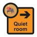 The photograph features a Spectrum Industrial Directional Sign for Assisted Living, with a Quiet Room arrow pointing to the right. The sign is labeled SA FMX and measures 305 x 310mm.