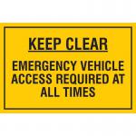 The picture features a rectangular industrial safety sign with bold black text on a bright yellow background. The words Keep clear and Emergency vehicle access required at all times are prominently displayed, with the phrase PP (400 x 300mm) EDU018 in smaller font at the bottom. The sign is labeled as an educational sign for Spectrum Industrial, with a durable and weatherproof design suitable for workplace environments.
