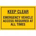 The picture features a rectangular industrial safety sign with bold black text on a bright yellow background. The words Keep clear and Emergency vehicle access required at all times are prominently displayed, with the phrase PP (400 x 300mm) EDU018 in smaller font at the bottom. The sign is labeled as an educational sign for Spectrum Industrial, with a durable and weatherproof design suitable for workplace environments.