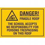 The photograph shows a Spectrum Industrial Safety Signs Educational Sign with a bold red border and the words Danger. Fragile Roof in white capital letters. The sign also states that the school holds no liability for trespassers on the roof. The sign measures 400 x 300mm and has the code EDU020 printed on it.