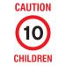 This photograph captures a yellow educational sign from Spectrum Industrial with the words Caution Children and Speed 10 in bold red text. The sign measures 400 x 300mm and is made of PP material. It is designed to promote safety in industrial settings.