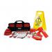 The photograph features the Spectrum Industrial locks Large Lockout Kit, model LOK117. The kit contains a variety of brightly colored safety padlocks, tags, and hasps for securing machinery and equipment during maintenance or repairs. The durable carrying case keeps all items organized and easily accessible.