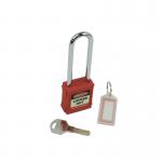 The photograph shows a red Spectrum Industrial safety lockout padlock with a long shackle. The lock appears sturdy and reliable, designed for industrial use. The red color stands out and adds a bold touch to the practical design.