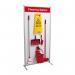 This photograph captures a Spectrum Industrial Cleaning Systems & Trolleys Shadowboard in a Multi-Purpose Frame. The shadowboard features a bright red frame and is designed in a cleaning station style. On the board, various tools and equipment for industrial cleaning are neatly hung and organized.