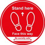 Stand Here Face This Way Floor Graphic; Self Adhesive Vinyl Laminated; Red (200mm dia) STP276