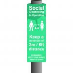 Turquoise Social Distancing In Operation Post/Bollard Sign - (800mm high x 150mm diameter post)