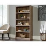 This picture features a stunning Teknik Office Barrister Home 5 Shelf Bookcase in a rich Salt Oak Finish. It boasts three adjustable shelves for easy organization and a simple assembly process. A must-have addition to any stylish home or office space.