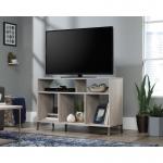 Teknik Office City Centre TV Stand in Champagne Oak finish with spacious top to accommodate up to a 50â€ TV Shelving for ample storage and durable sa 5426059