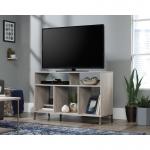 Teknik Office City Centre TV Stand in Champagne Oak finish with spacious top to accommodate up to a 50&rdquo; TV Shelving for ample storage and durable sati