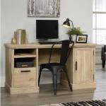 Teknik Office Prime Oak Effect Executive Desk with a durable 1&rdquo; thick desktop, open storage, letter / legal sized filer drawer and storage area behind