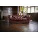 Teknik Office Chesterfield 3 seater button back leather sofa in Antique Red with scrolled arms, elegant turned legs and pigmented leather  9900001AR