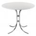 This photo features a sleek, modern bistro table in a beautiful white finish. The table stands on four slender legs with a curved design, creating an elegant and functional piece for any dining space. The smooth surface and clean lines give off a minimalist and contemporary vibe.