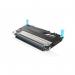 The photograph captures a set of TSW ink cartridges, specifically the Dell 1235 Cyan toner model with a page yield of 1500. The packaging is labeled with the code C593-10494 and features vibrant colors and sleek design, making it stand out on a shelf.